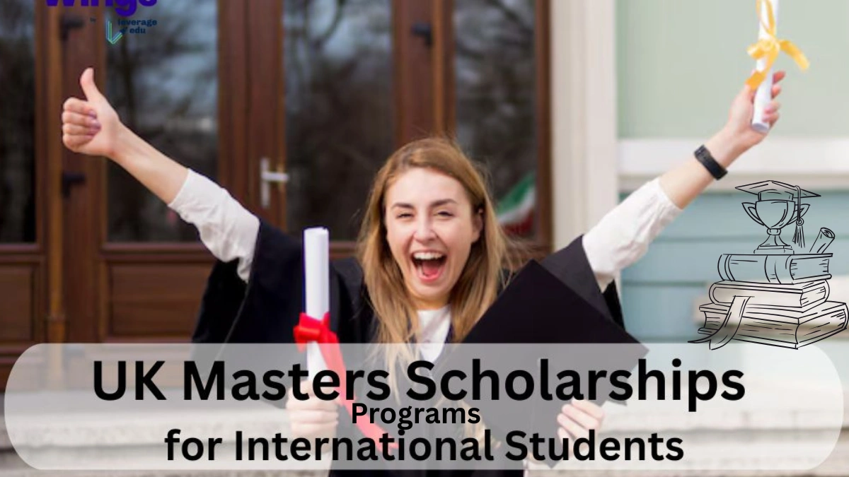 Master’s Programs A happy graduate wearing a black gown holds a diploma and gives a thumbs-up, celebrating outside a university building.